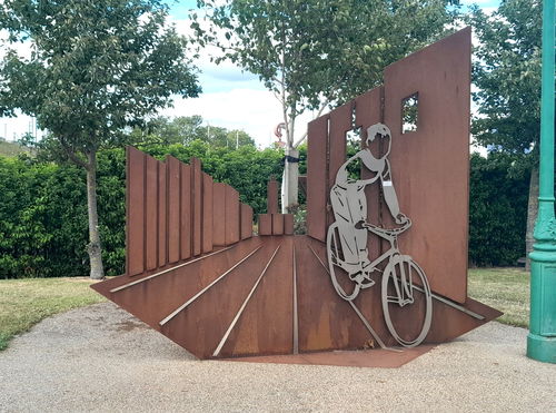 Boy and Bicycle Sculpture