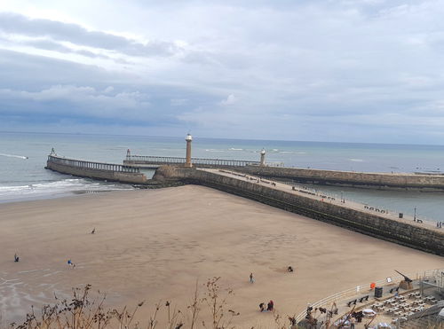 Whitby Piers And Lighthouses